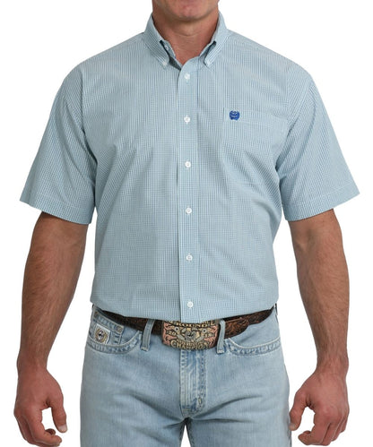 Front view of short sleeve light blue geometric print cinch button down shirt with single chest pocket