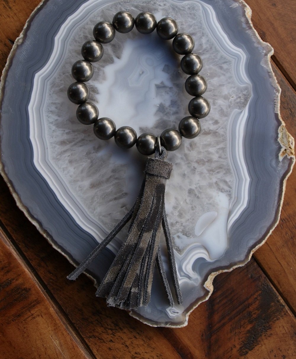 Turquoise Haven Women's Black Cheetah Tassel Bracelet- Style #81849 ! desc :  ! caption :