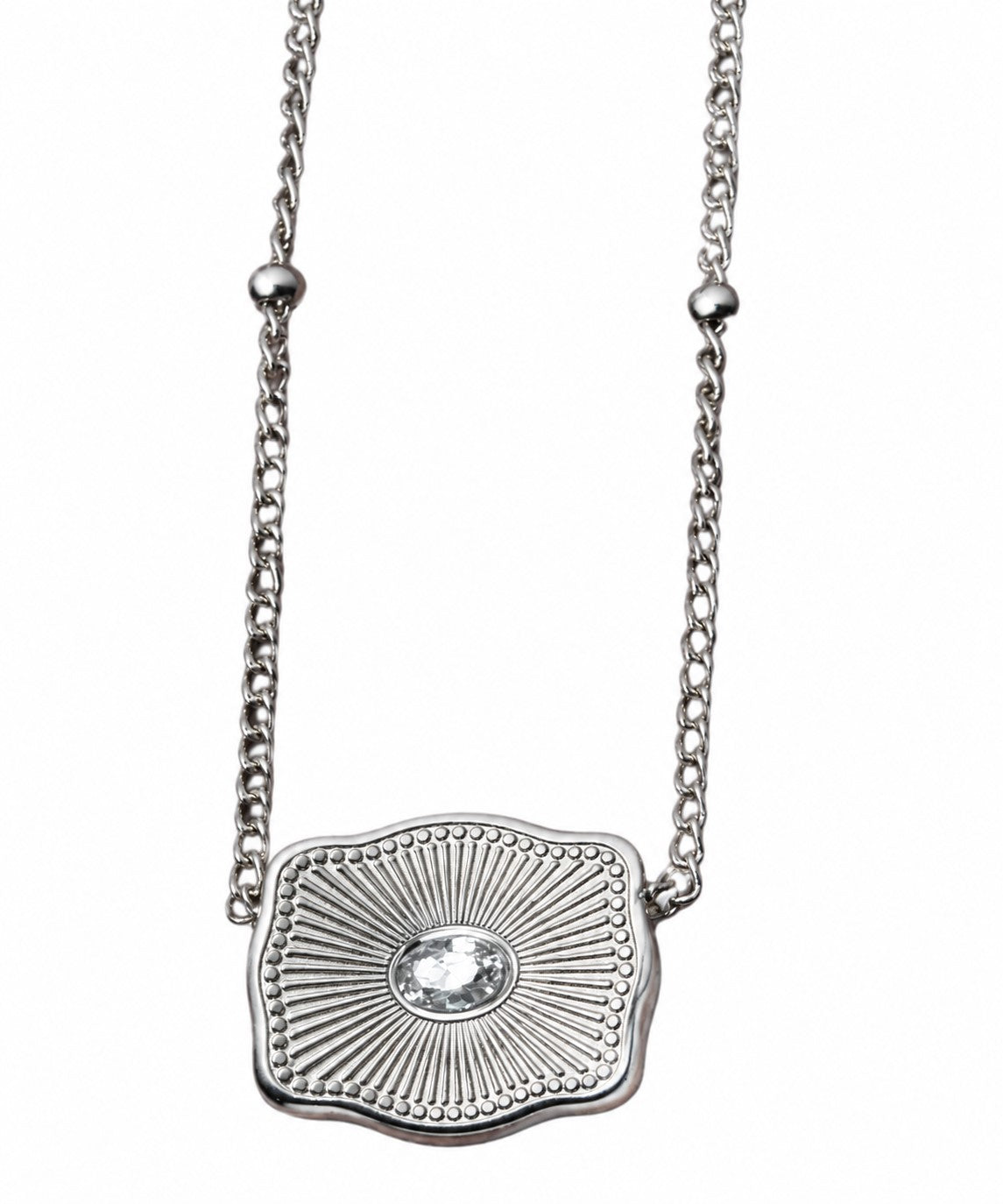 backside ultra mini silver belt buckle with cubic zirconia in center on white background