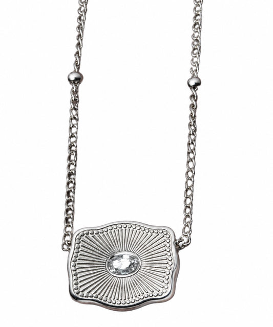 backside ultra mini silver belt buckle with cubic zirconia in center on white background